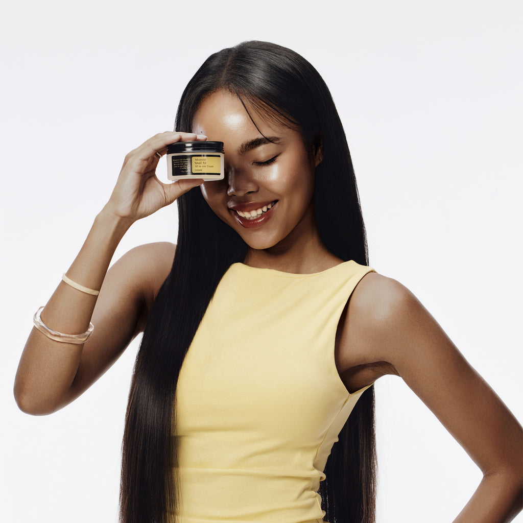 COSRX Advanced Snail 92 All In One Cream 100gm with model