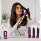 Woman using a Dynamic Life 5 in 1 Hot Air Styling tool with additional attachments on a vanity table.