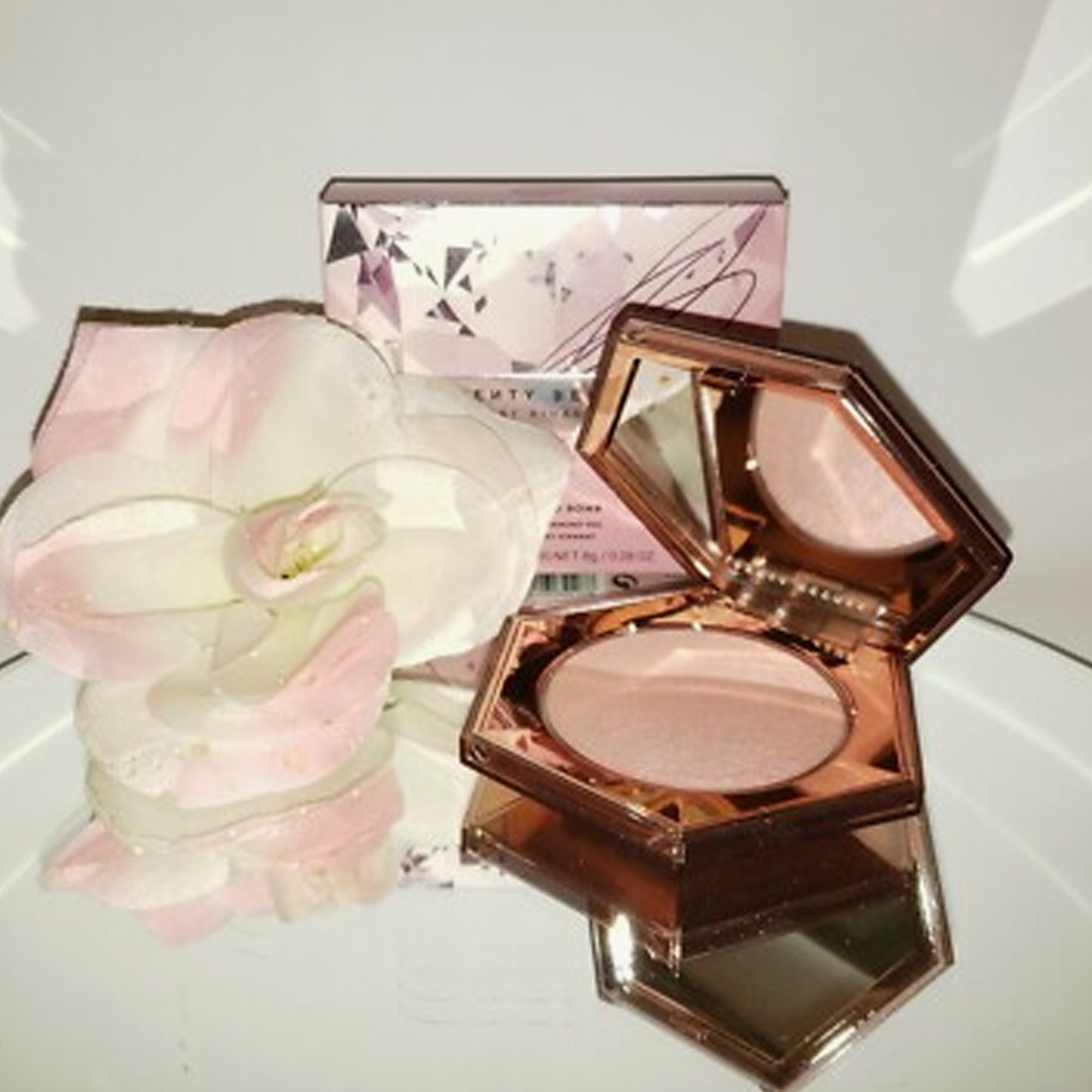 fenty beauty diamond bomb highlighter rose rave 02 8gm review